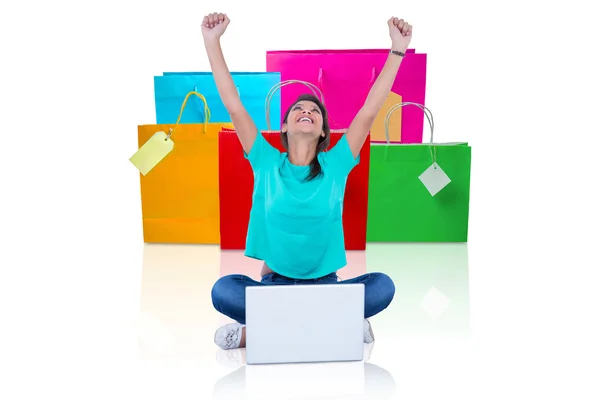 Woman sitting by laptop — Stock Photo, Image