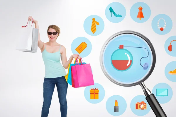 Mujer sosteniendo bolsas de compras —  Fotos de Stock