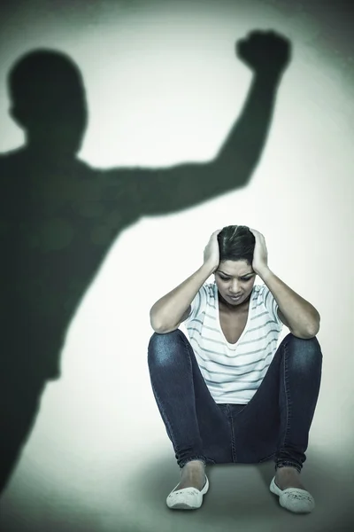 Depressed woman crouching — Stock Photo, Image