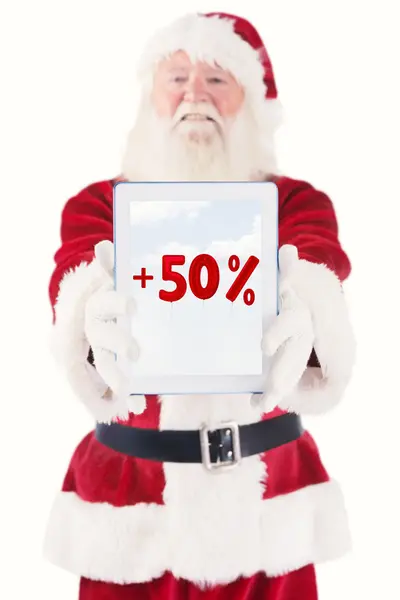 Santa apresenta um tablet PC — Fotografia de Stock