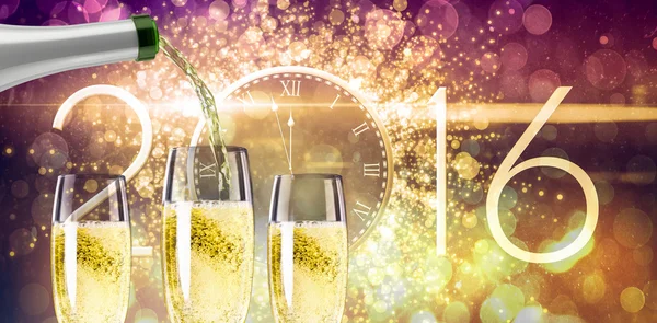 Composite image of champagne pouring — Stock Photo, Image