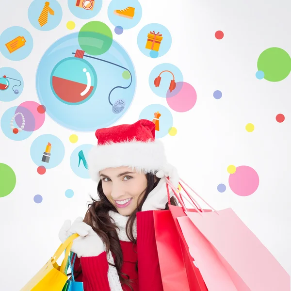 Morena sosteniendo bolsas de compras — Foto de Stock