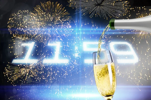 Composite image of champagne pouring — Stock Photo, Image