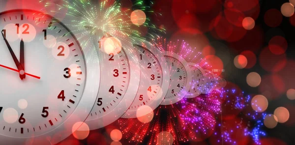 Clocks against colourful fireworks — Stock Photo, Image