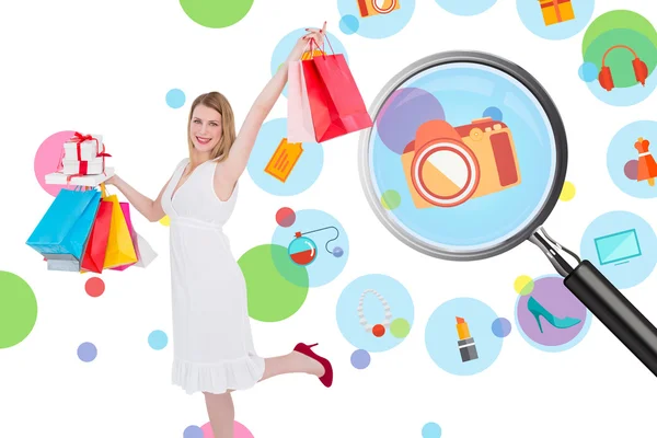 Blonde with shopping bags and gifts — Stock Photo, Image