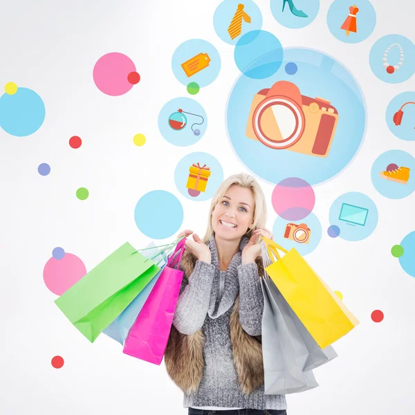 Blonde bedrijf shopping tassen — Stockfoto