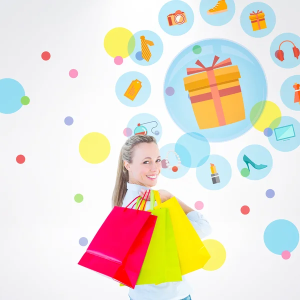 Blonde holding shopping bags — Stock Photo, Image