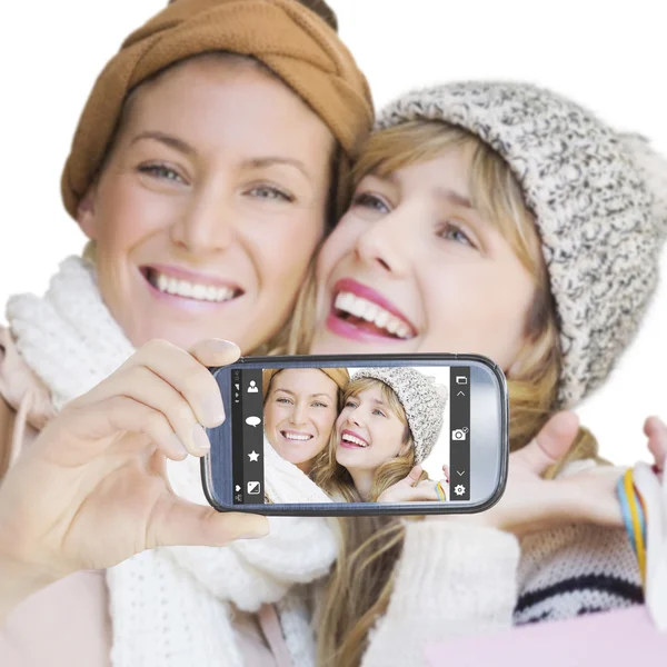 Coppia che tiene smartphone — Foto Stock