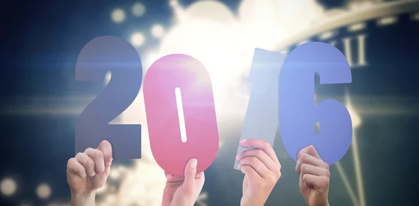 Composite image of hands showing 2016 — Stock Photo, Image