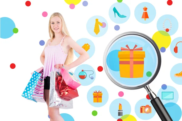 Blonde holding shopping bags — Stock Photo, Image