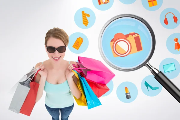 Woman holding shopping bags — Stock Photo, Image