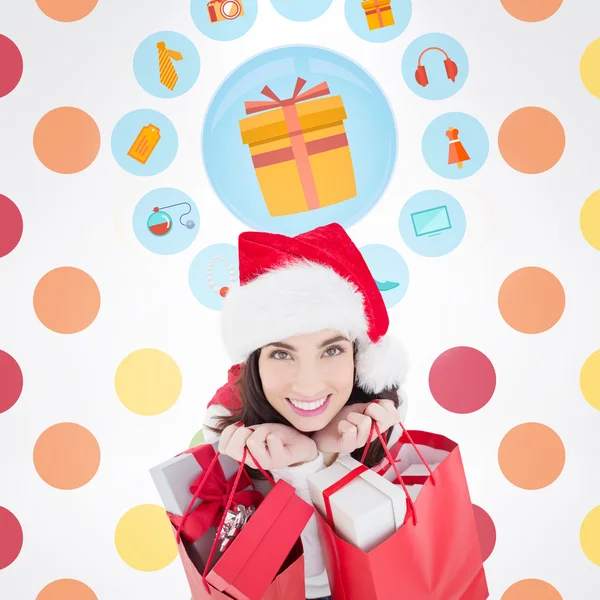 Brunette holding shopping bags — Stock Photo, Image