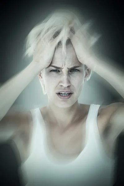 Sad blonde woman with head pain — Stock Photo, Image