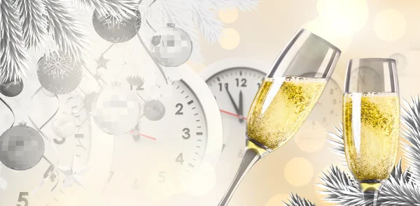 Composite image of champagne glasses clinking — Stock Photo, Image