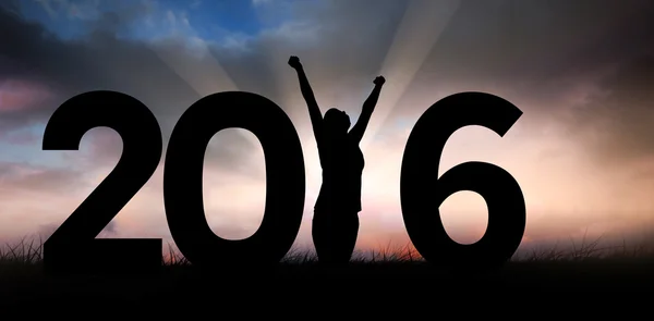 Composite image of cheering female silhouette — Stock Photo, Image