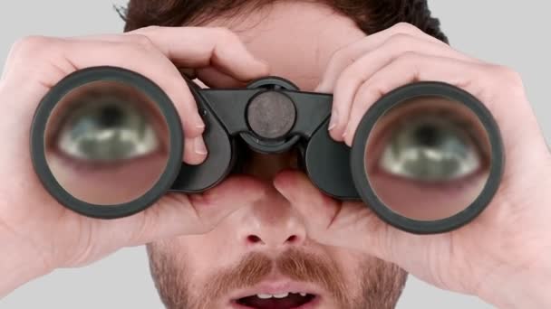 Man looking through binoculars — Stock Video © Wavebreakmedia #91732456