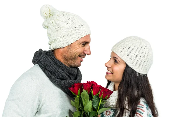 Couple holding roses bouquet — Stock Photo, Image