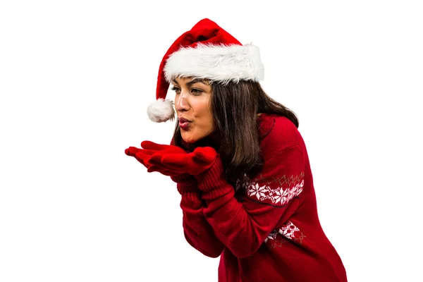 Brunette blowing over hands — Stock Photo, Image