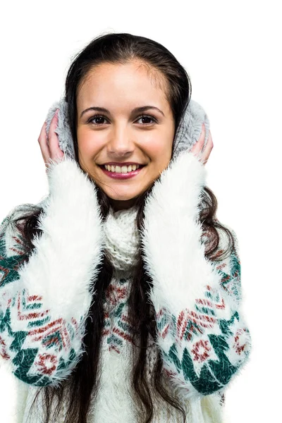 Leende kvinna med hörselkåpor Royaltyfria Stockbilder