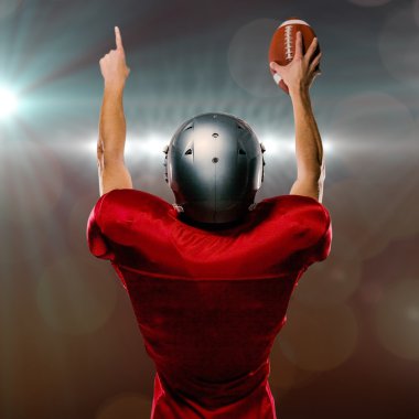 American football player with arms raised clipart