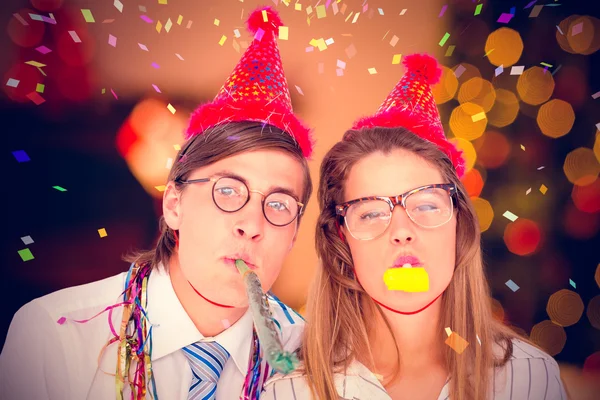 Geeky hipster wearing a party hat — Stock Photo, Image