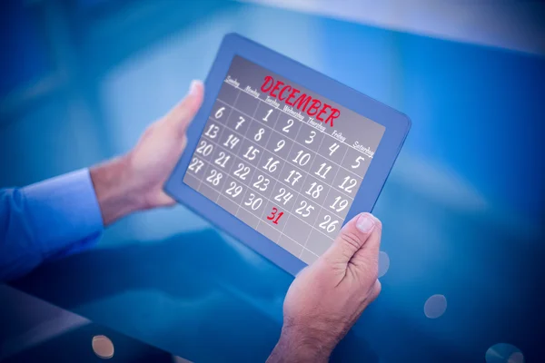 Businessman using his tablet — Stock Photo, Image