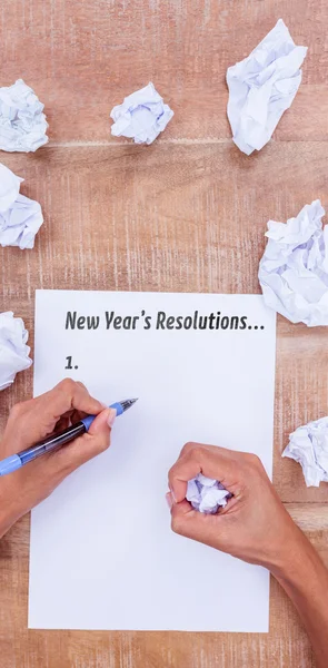 Mani scrittura nuovo anno risoluzione elenco — Foto Stock