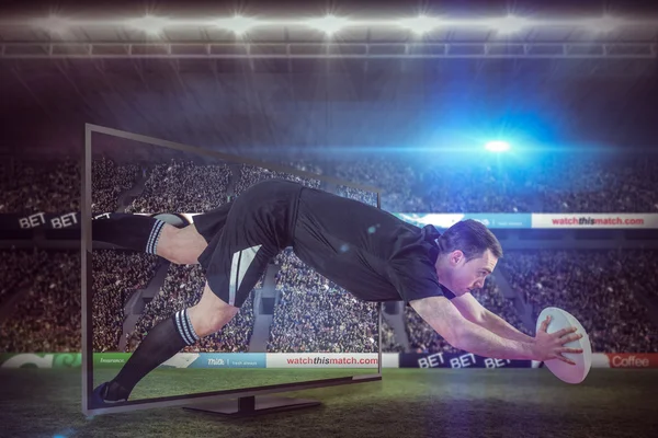 Rugby player scoring a try — Stock Photo, Image
