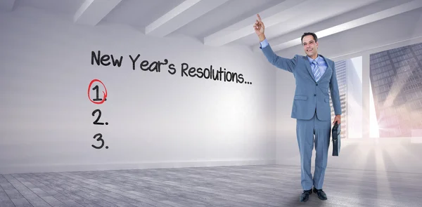 Cheerful businessman raising his hand — Stock Photo, Image