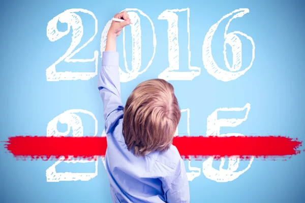 Cute pupil holding chalkboard — Stock Photo, Image