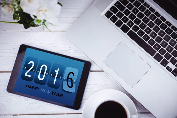 Nieuwjaar afbeelding tegen de Tablet PC — Stockfoto