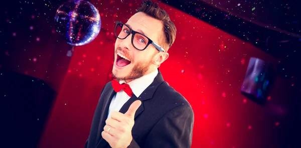 Geeky hipster pointing at camera — Stock Photo, Image