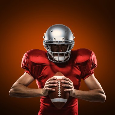 American football player helmet holding ball clipart