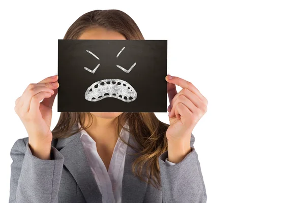 Composite image of businesswoman showing card — Stock Photo, Image