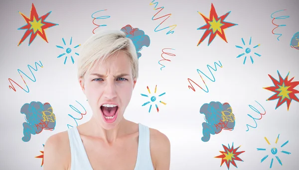 Composite image of angry blonde woman screaming — Stock Photo, Image