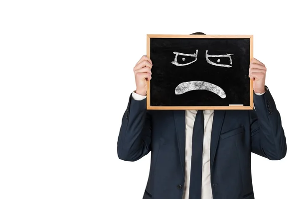 Composite image of businessman holding board — Stock Photo, Image