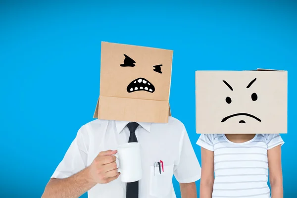 Depressed woman with box over head — Stock Photo, Image