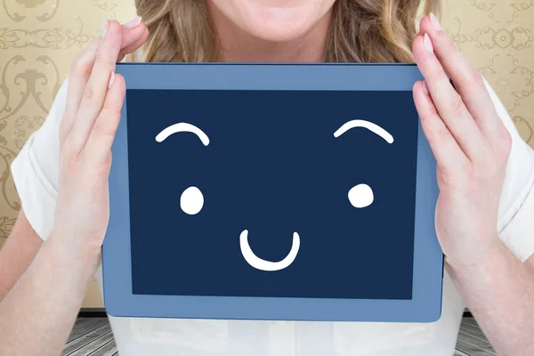 Composite image of woman showing tablet pc — Stock Photo, Image