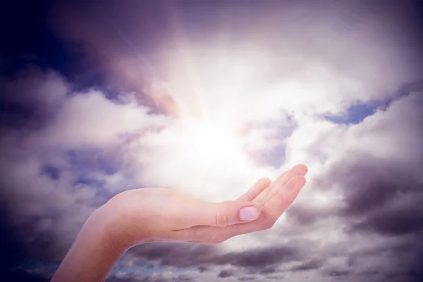 Woman presenting with her hand — Stock Photo, Image