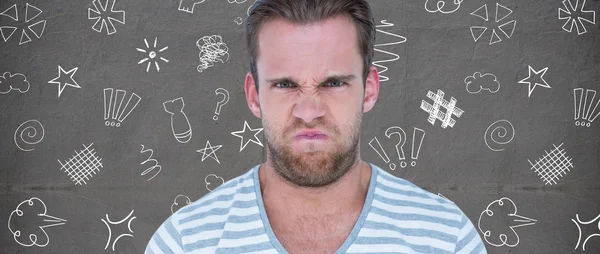 Composite image of angry man — Stock Photo, Image