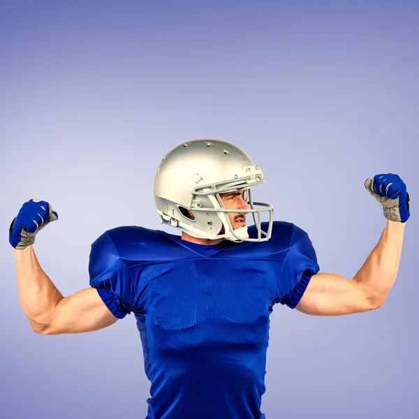 Hráč amerického fotbalu, protahuje svaly — Stock fotografie