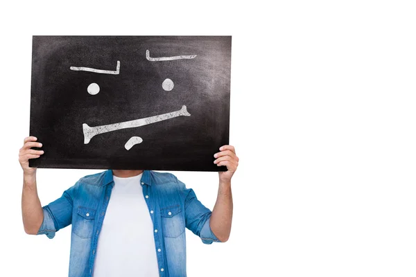 Imagem composta de homem casual mostrando placa — Fotografia de Stock