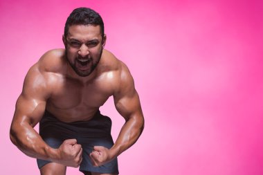 bodybuilder man flexing his muscles clipart