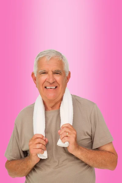 Portrait of a senior man with towel — Stock Photo, Image