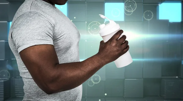 Fit man with protein shake — Stock Photo, Image