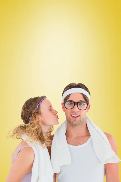 Geeky hipster kissing her boyfriend — Stock Photo, Image
