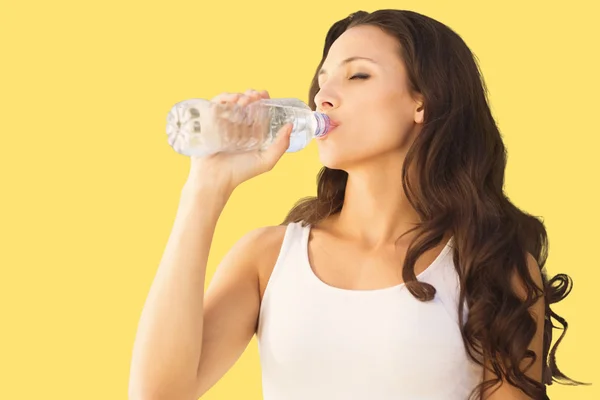 Brunette drinking water — Stock Photo, Image