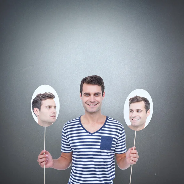 Man holding balloons of his face — Stock Photo, Image