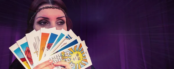 Fortune teller holding tarot cards — Stock Photo, Image