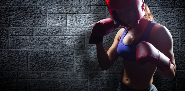 Portrait of female fighter with fighting stance — Stock Photo, Image